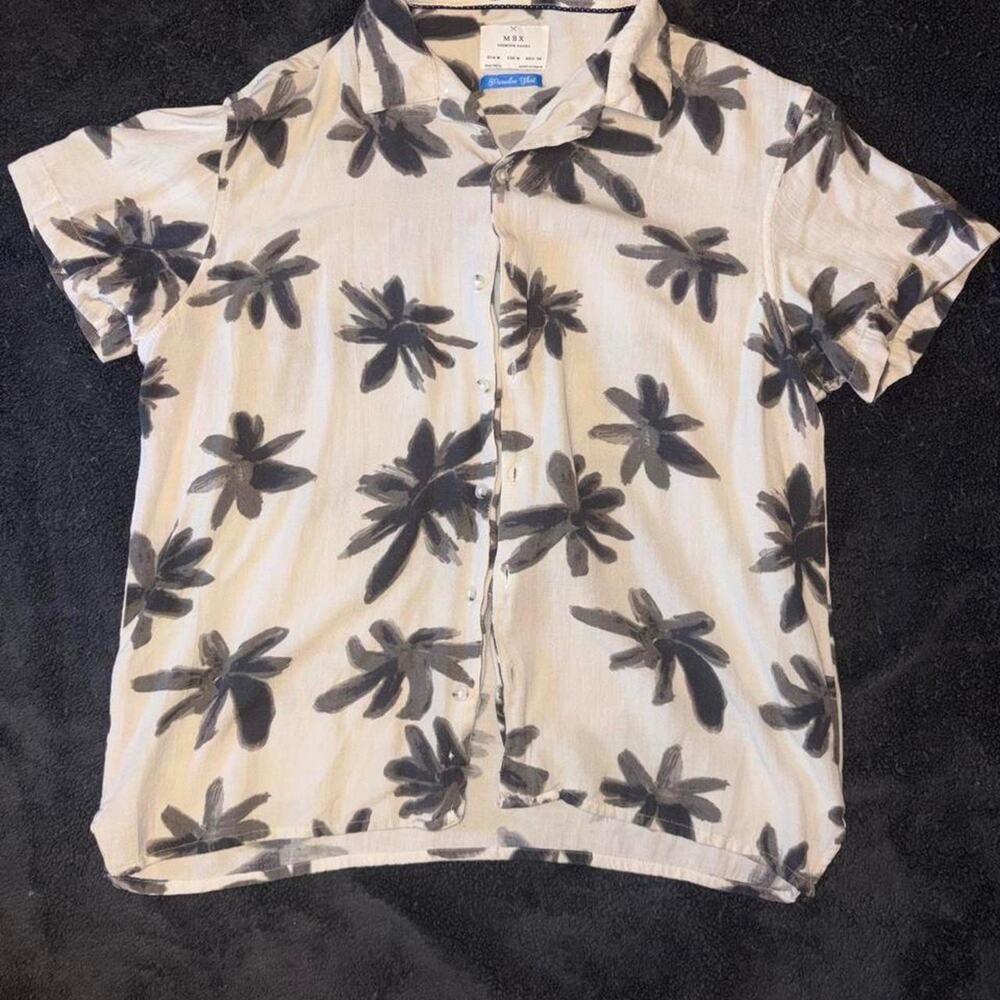 MBX Paradise Shirt with black palm tree silhouettes on a cream background